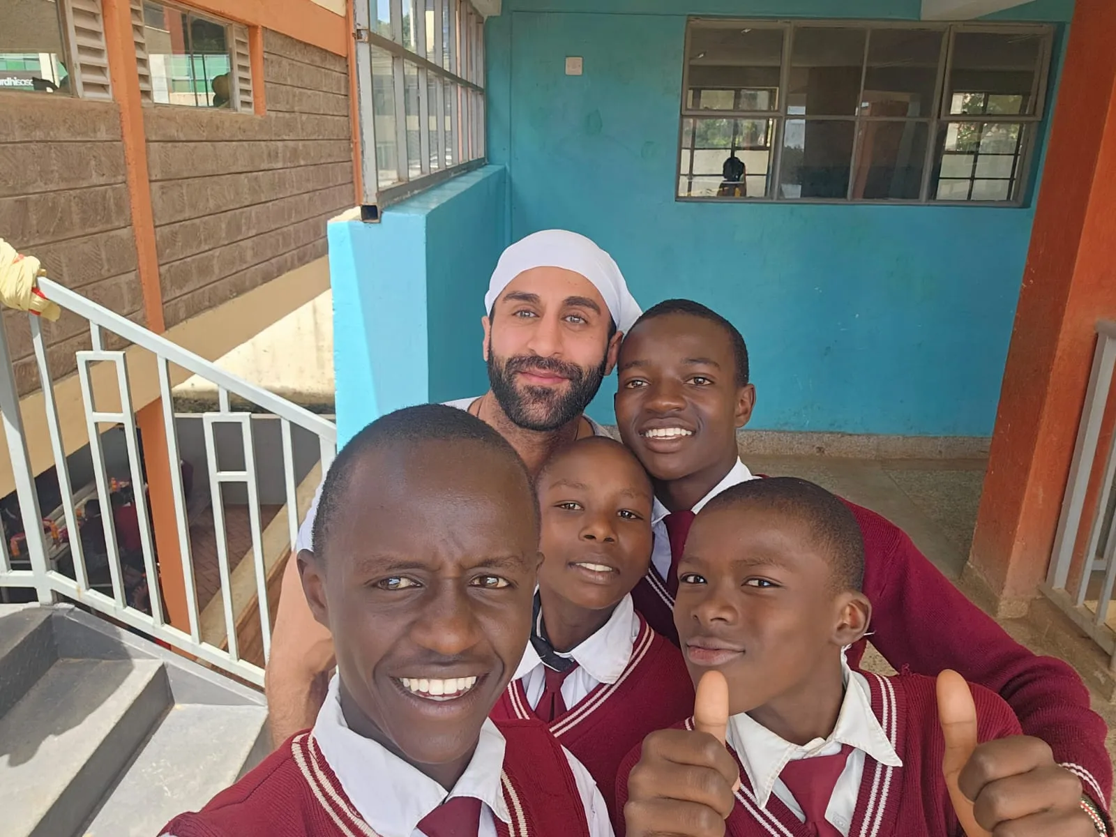 Risingh Foundation with students at the adopted school